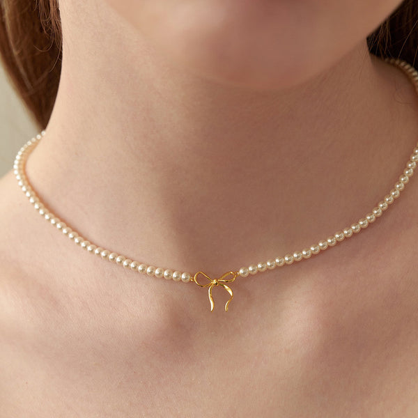 Bow pearl necklace